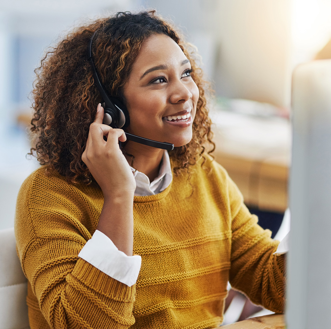 Woman answering office phone