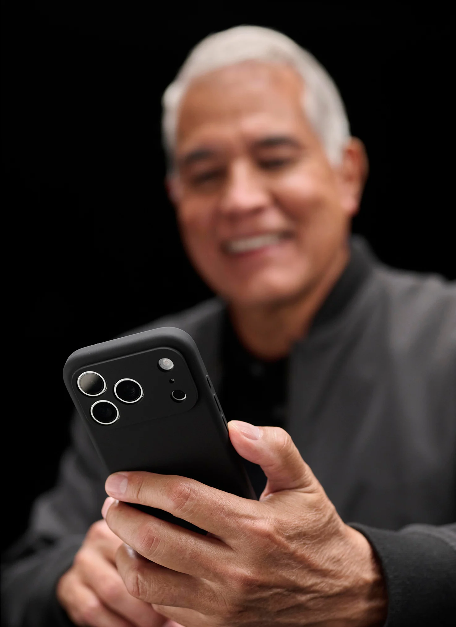 man using a smartphone